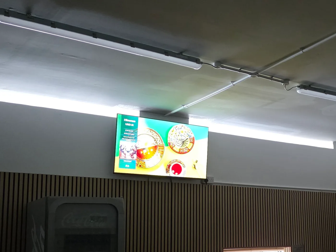 Digital display screens wired in a commercial premises